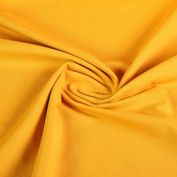 Tricot stof okergeel