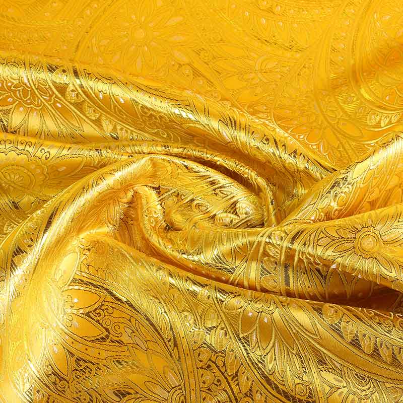 Jacquard fantasie bloem okergeel goud