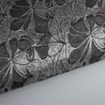 Jacquard bloem tone in tone lurex zwart