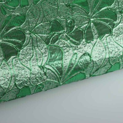 Jacquard bloem tone in tone lurex groen