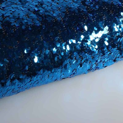 Mesh stof met druppels aqua