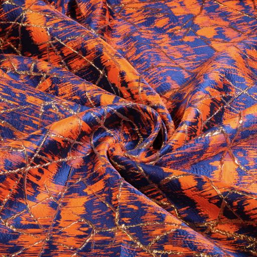 Jacquard stof goud lurex abstract oranje/kobalt