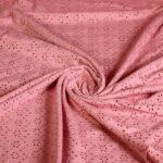 Jersey broderie stof zalm