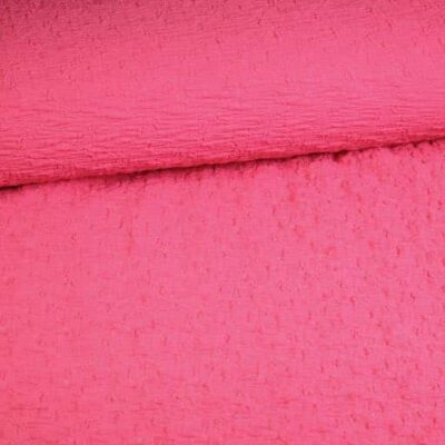 Tricot broderie stof fuchsia