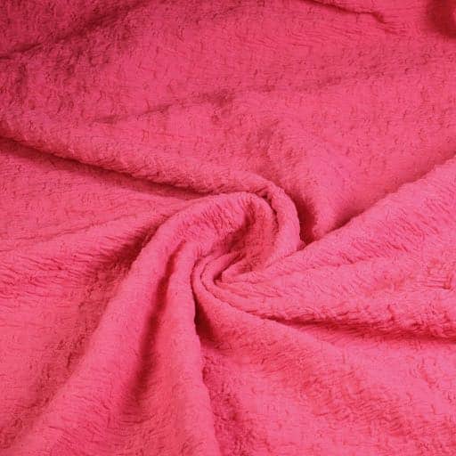 Tricot broderie stof fuchsia